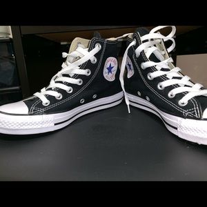 Never worn black and white high top converse .